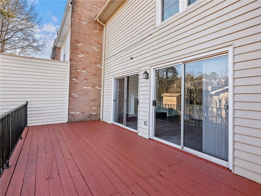 6500 Gaines Ferry Road, Unit A2 Flowery Branch, GA 30542 - Photo 30 of 42 a view of a house with wooden floor