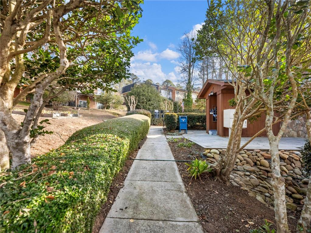 6500 Gaines Ferry Road, Unit A2 Flowery Branch, GA 30542 - Photo 38 of 42 a view of path along with trees