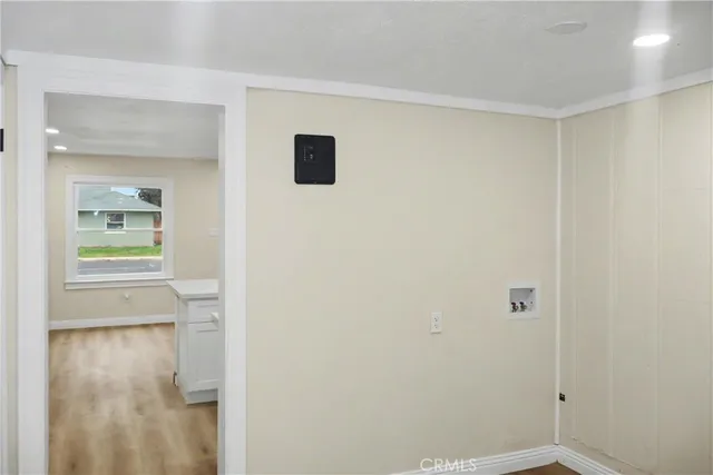 a view of a bathroom from the hallway