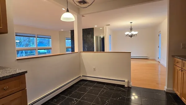 a view of a hallway with entryway