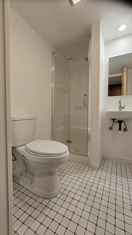 91 Mary Ellen Road Newton, MA 02468 - Photo 28 of 32 a bathroom with a toilet and a shower