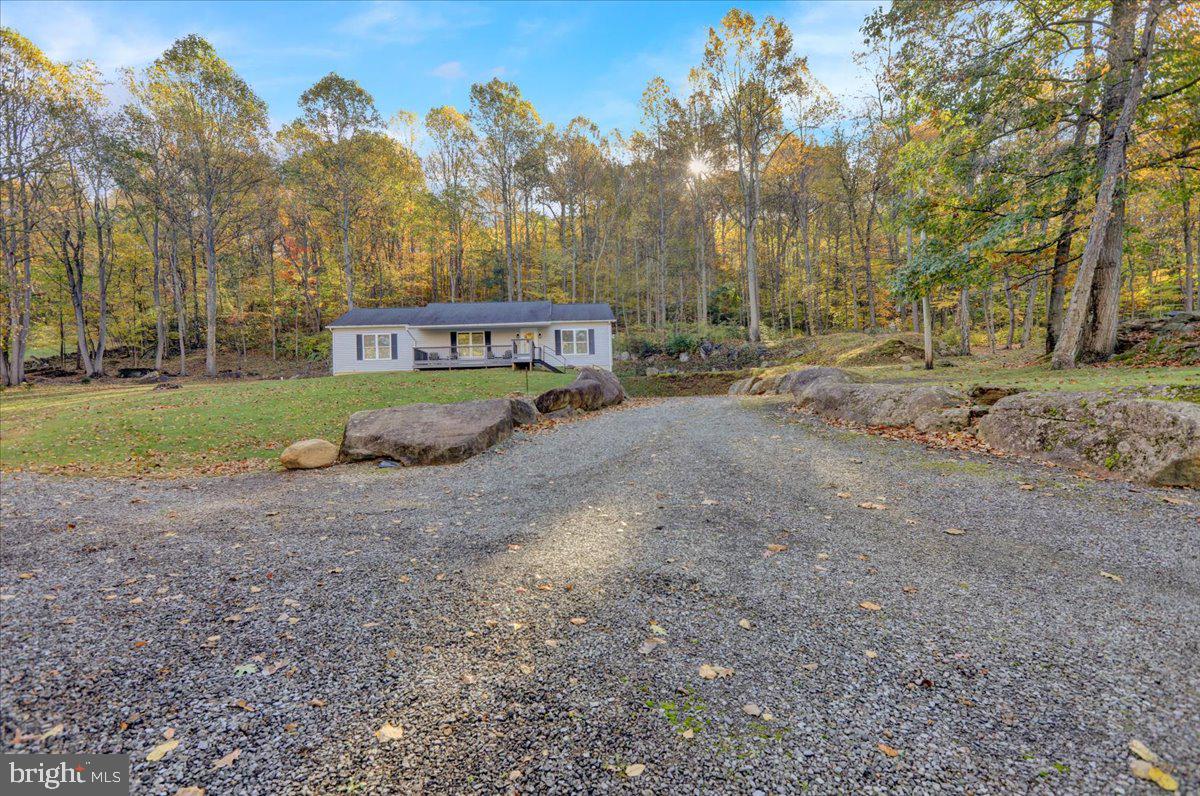 119 Smoketown Road Mertztown, PA 19539 - Photo 2 of 40 a view of a big yard with large trees