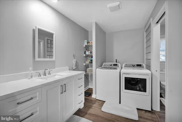 a utility room with dryer and washer