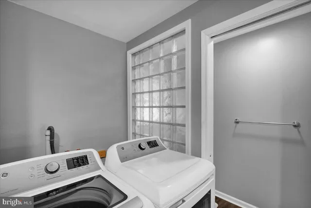 a utility room with dryer and washer