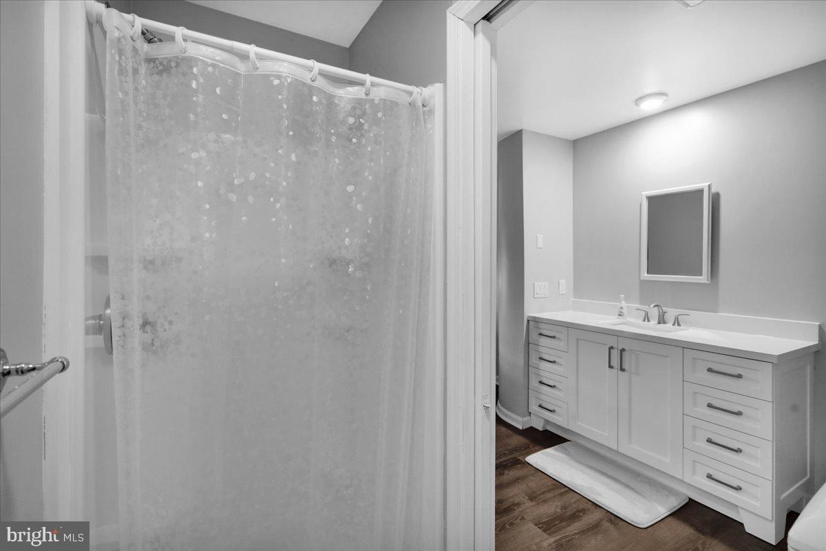 119 Smoketown Road Mertztown, PA 19539 - Photo 26 of 40 a bathroom with a double vanity sink and mirror