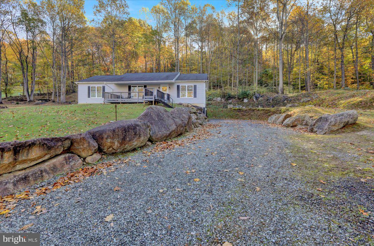 119 Smoketown Road Mertztown, PA 19539 - Photo 3 of 40 a view of a yard in front of a house