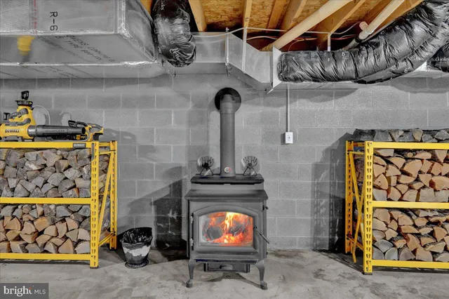 a kitchen with a stove and storage