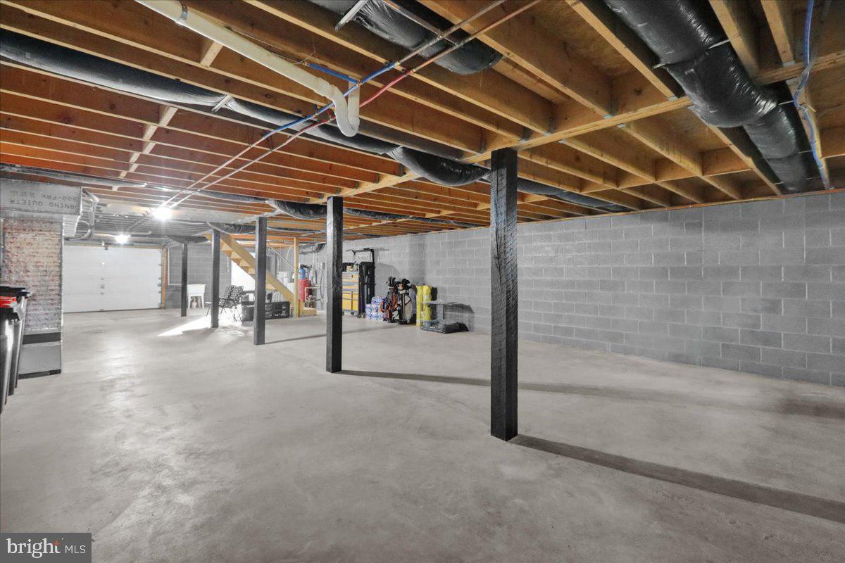 119 Smoketown Road Mertztown, PA 19539 - Photo 35 of 40 a view of water heater room with two washing machine