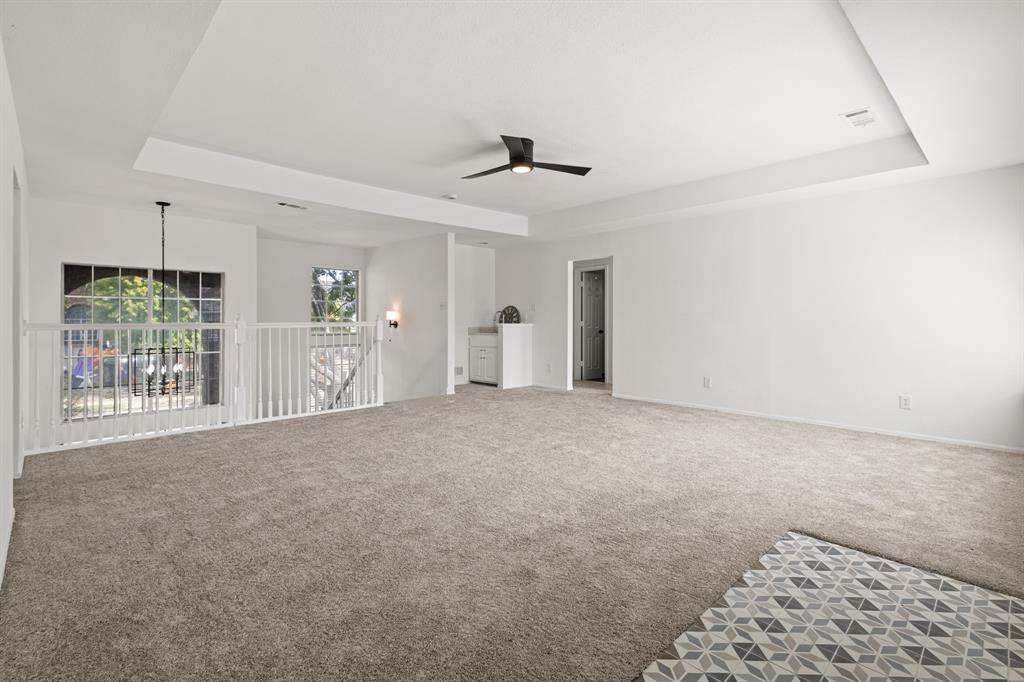 9502 Heartstone Lane Rowlett, TX 75087 - Photo 15 of 22 a view of an empty room with a window
