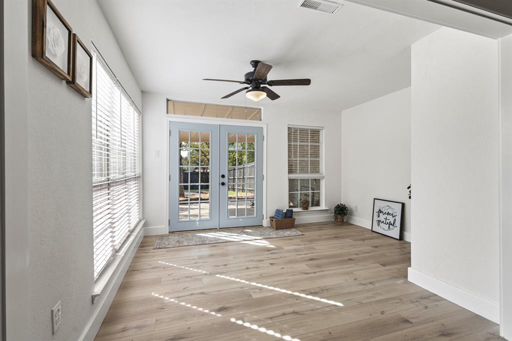 9502 Heartstone Lane Rowlett, TX 75087 - Photo 9 of 22 a view of an empty room with a window