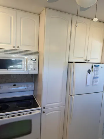 a close view of a refrigerator in kitchen