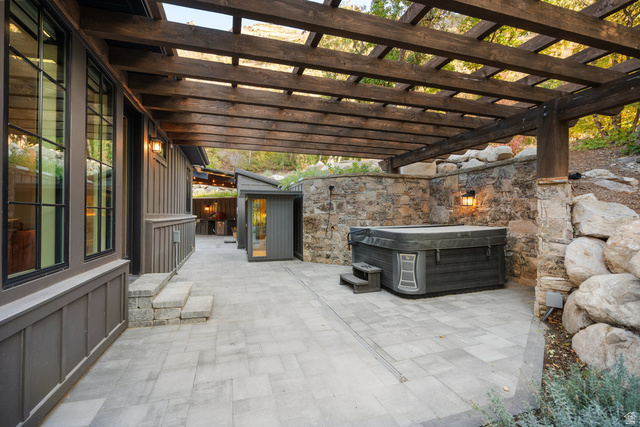 1141 South Oak Leaf Lane Springville, UT 84663 - Photo 115 of 147 Expansive stone paver patio featuring a wooden pergola overhead and a built-in hot tub