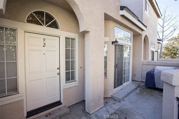 a view of front door and bedroom