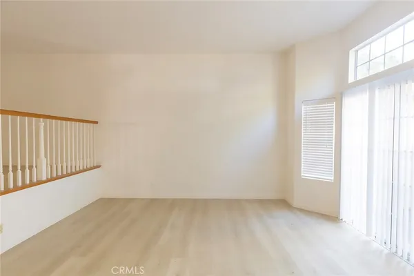 a view of an empty room and window