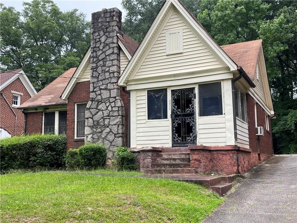 1709 Stokes Avenue Southwest Atlanta, GA 30310 - Photo 1 of 1 a view of a house with a yard