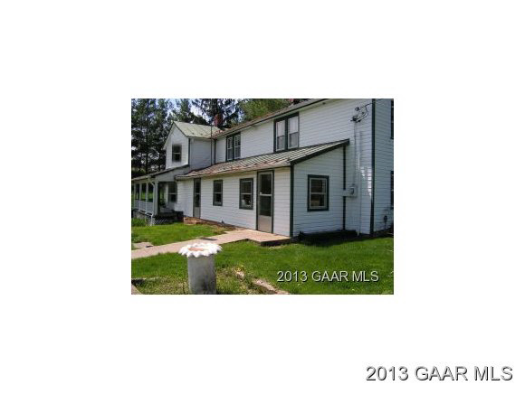2437 Shutterlee Mill Road Staunton, VA 24401 - Photo 1 of 5 a black and white photo of a house