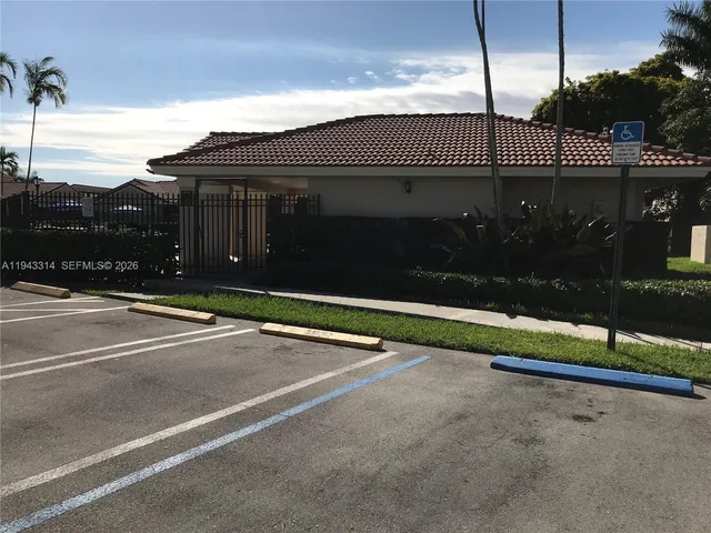 a front view of a house with street