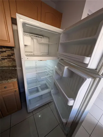 a balcony with view of palm trees