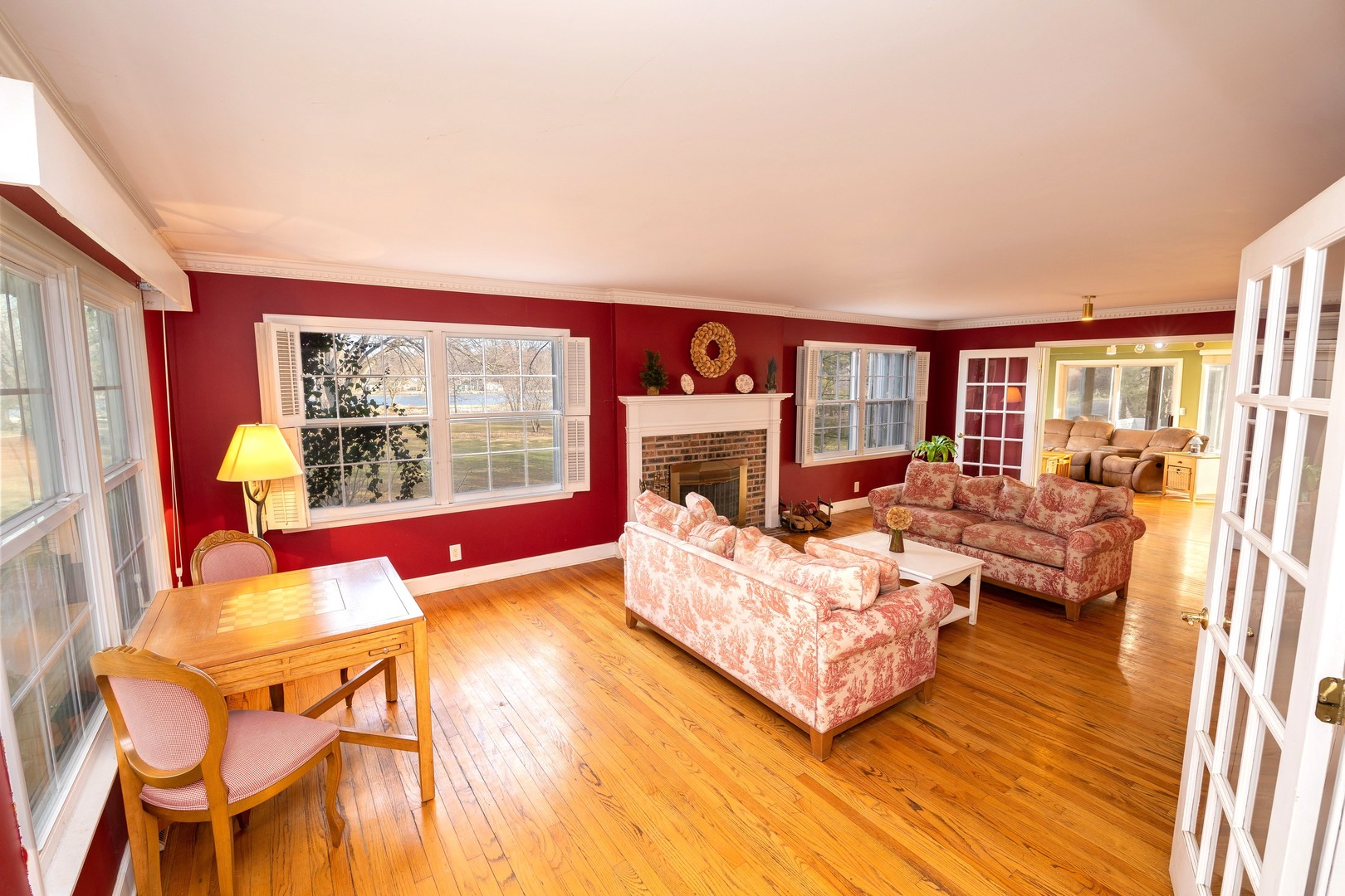 35W657 Park Lane St. Charles, IL 60175 - Photo 15 of 66 a living room with furniture and a fireplace