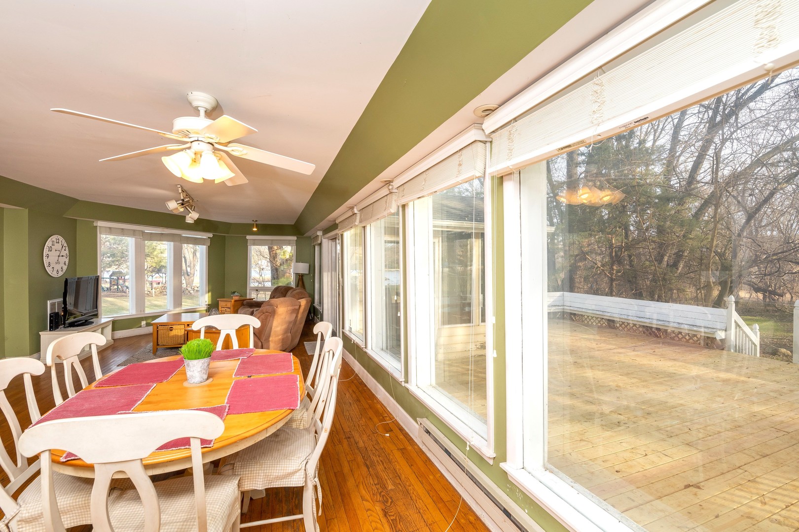 35W657 Park Lane St. Charles, IL 60175 - Photo 21 of 66 a dining room with furniture a chandelier and a floor to ceiling window