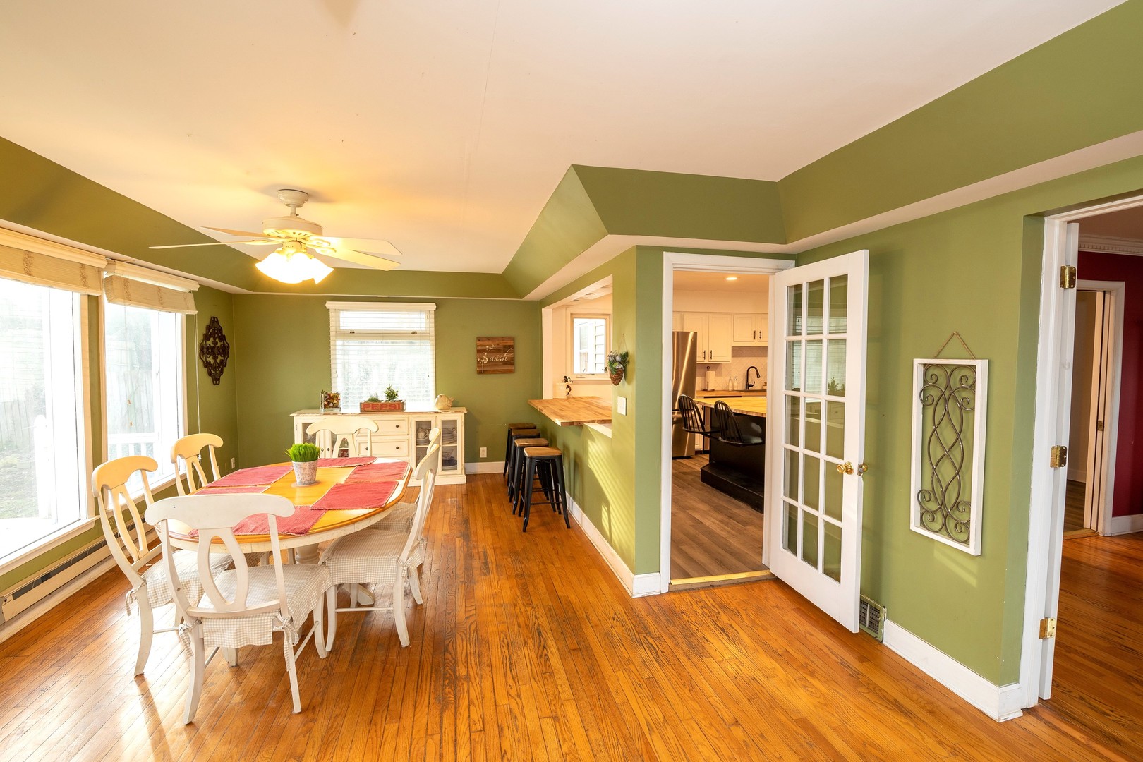 35W657 Park Lane St. Charles, IL 60175 - Photo 24 of 66 a view of a dining room with furniture and wooden floor