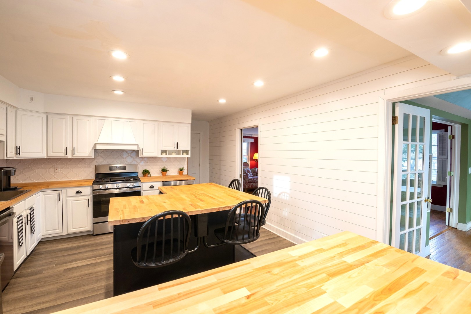 35W657 Park Lane St. Charles, IL 60175 - Photo 25 of 66 a large kitchen with kitchen island a sink stainless steel appliances and cabinets