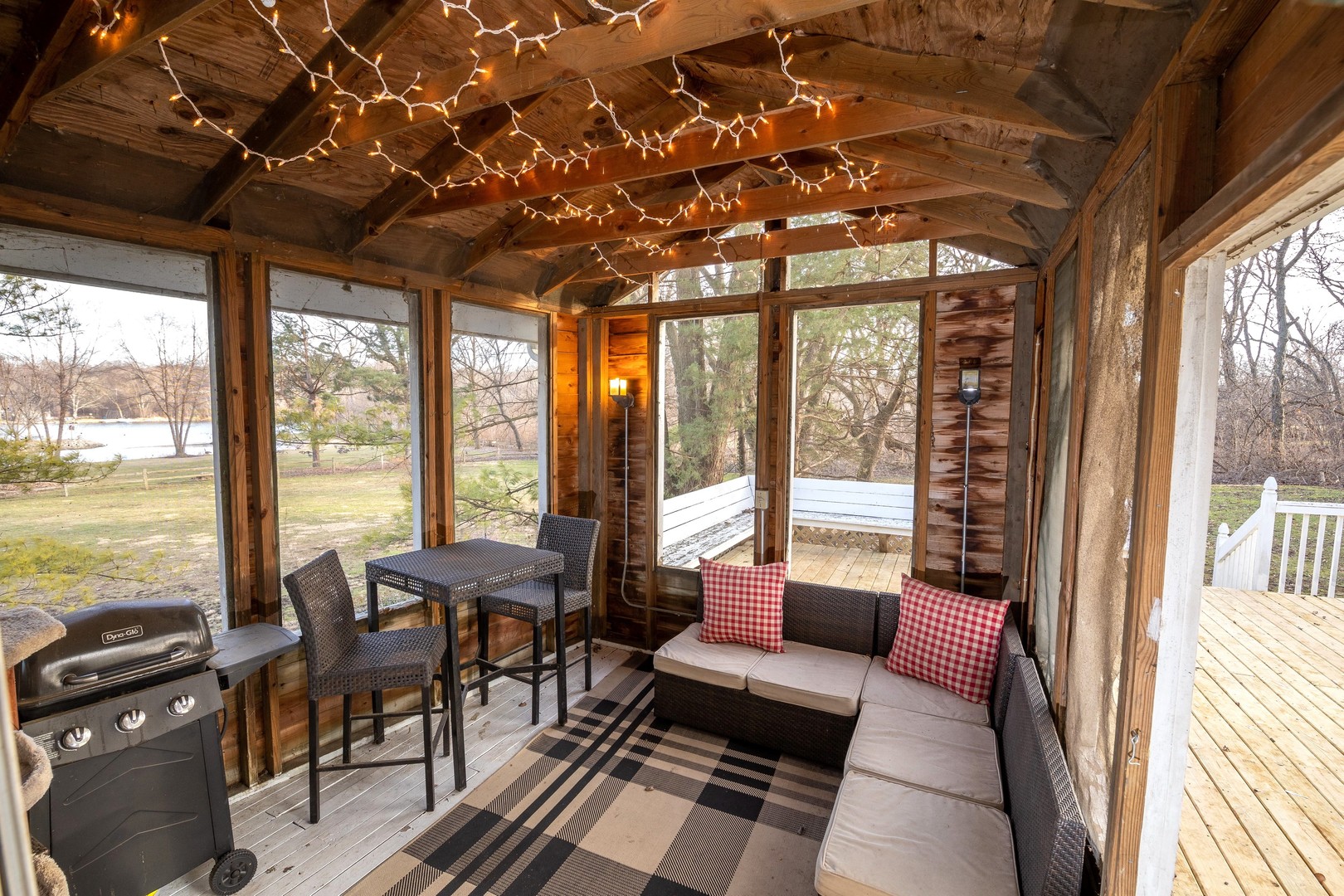 35W657 Park Lane St. Charles, IL 60175 - Photo 29 of 66 a living room with furniture and a floor to ceiling window