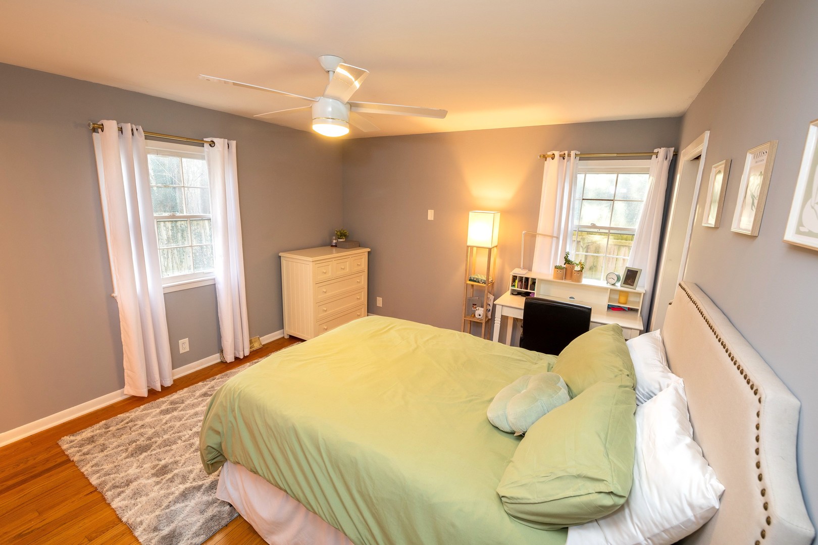 35W657 Park Lane St. Charles, IL 60175 - Photo 36 of 66 a bedroom with a bed and wooden floor