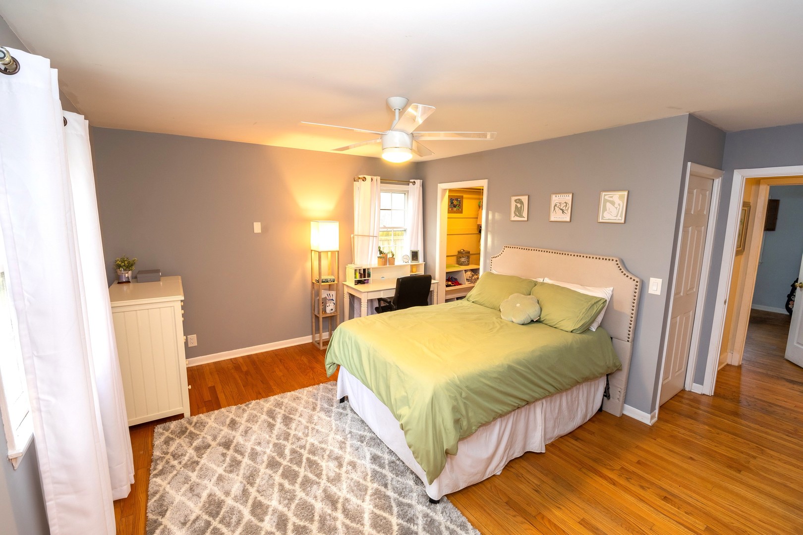 35W657 Park Lane St. Charles, IL 60175 - Photo 37 of 66 a bedroom with a bed and a chandelier