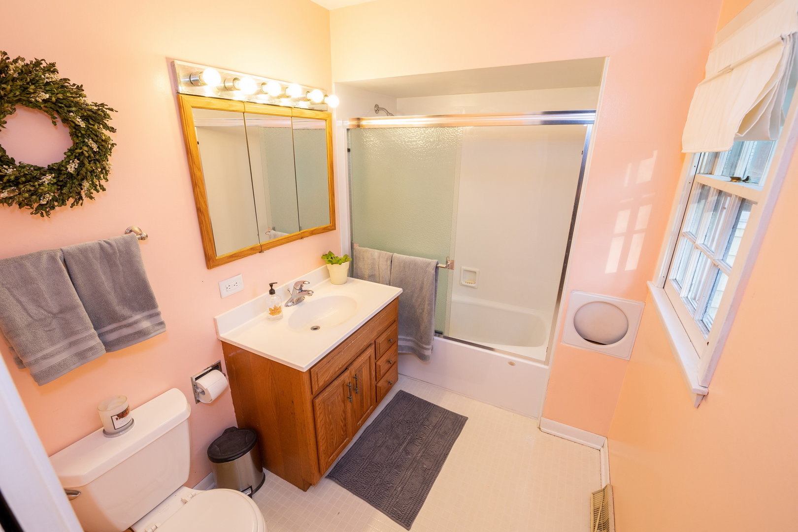 35W657 Park Lane St. Charles, IL 60175 - Photo 39 of 66 a bathroom with a sink a toilet a mirror and shower