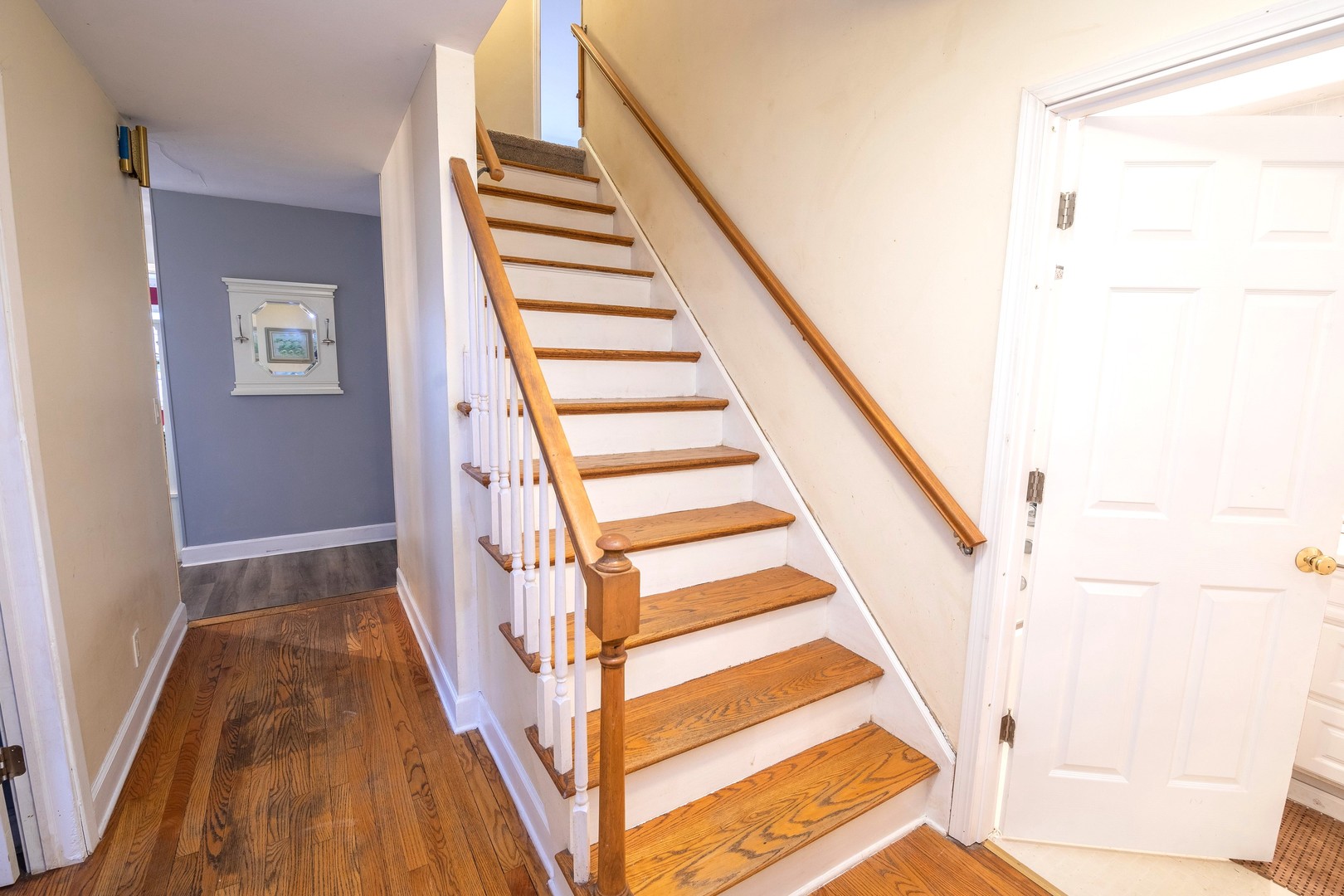 35W657 Park Lane St. Charles, IL 60175 - Photo 41 of 66 a view of staircase with wooden floor and white walls