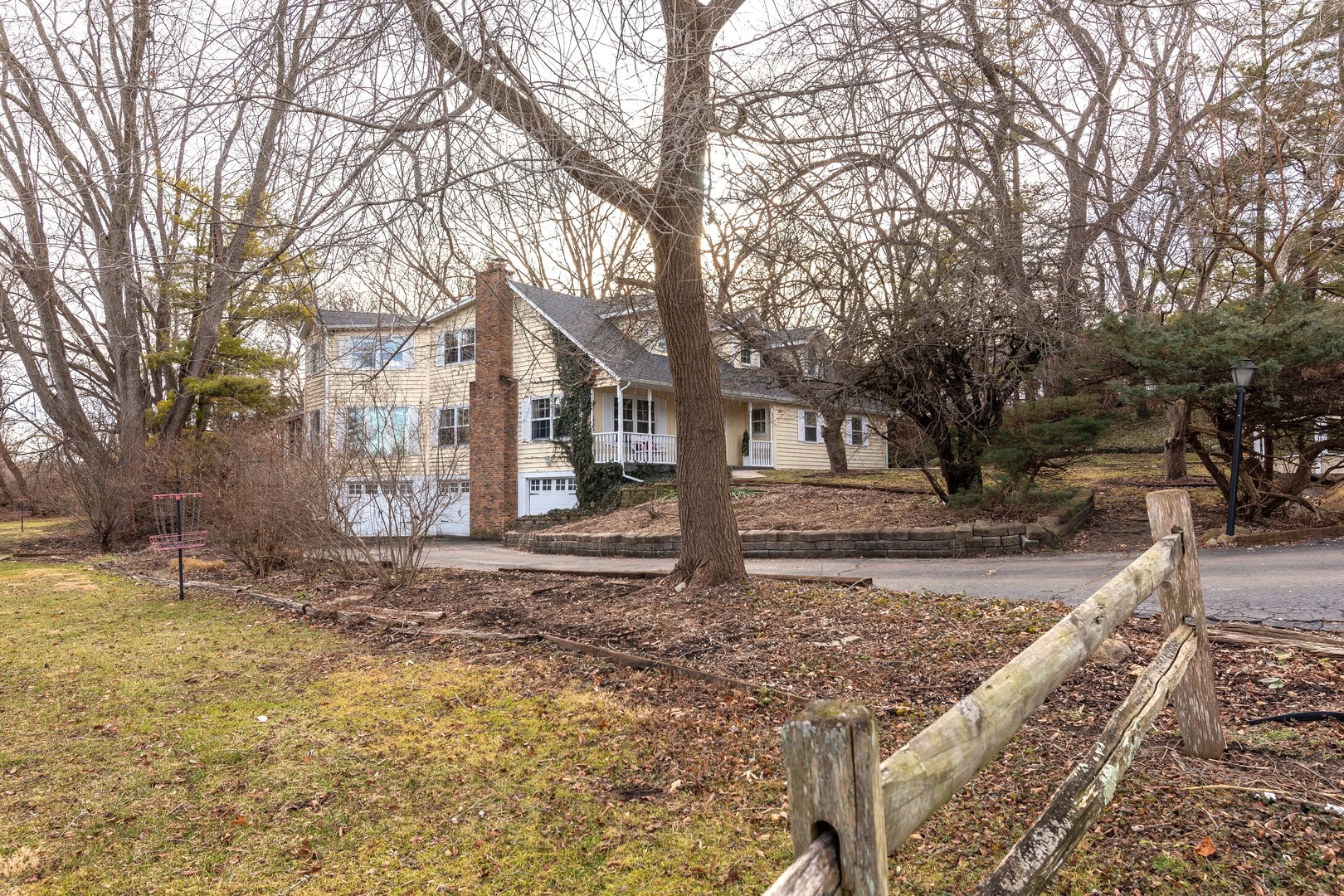35W657 Park Lane St. Charles, IL 60175 - Photo 7 of 66 a view of a yard with large trees