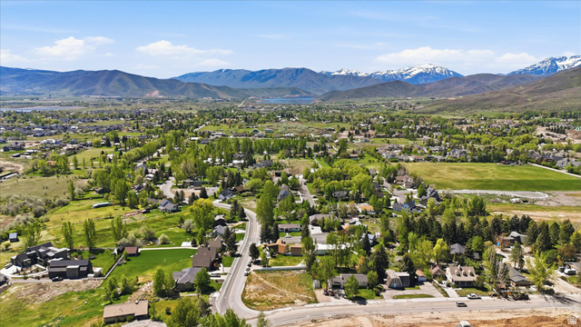 123 West 1050th North, Unit 41 Midway, UT 84049 - Photo 16 of 22 Expansive mountain valley setting featuring residential properties, verdant trees, and paved roadways