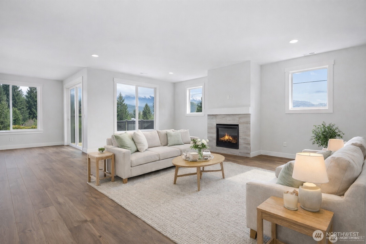 628 Prominence Street Winlock, WA 98596 - Photo 2 of 9 a living room with furniture a window and a fireplace