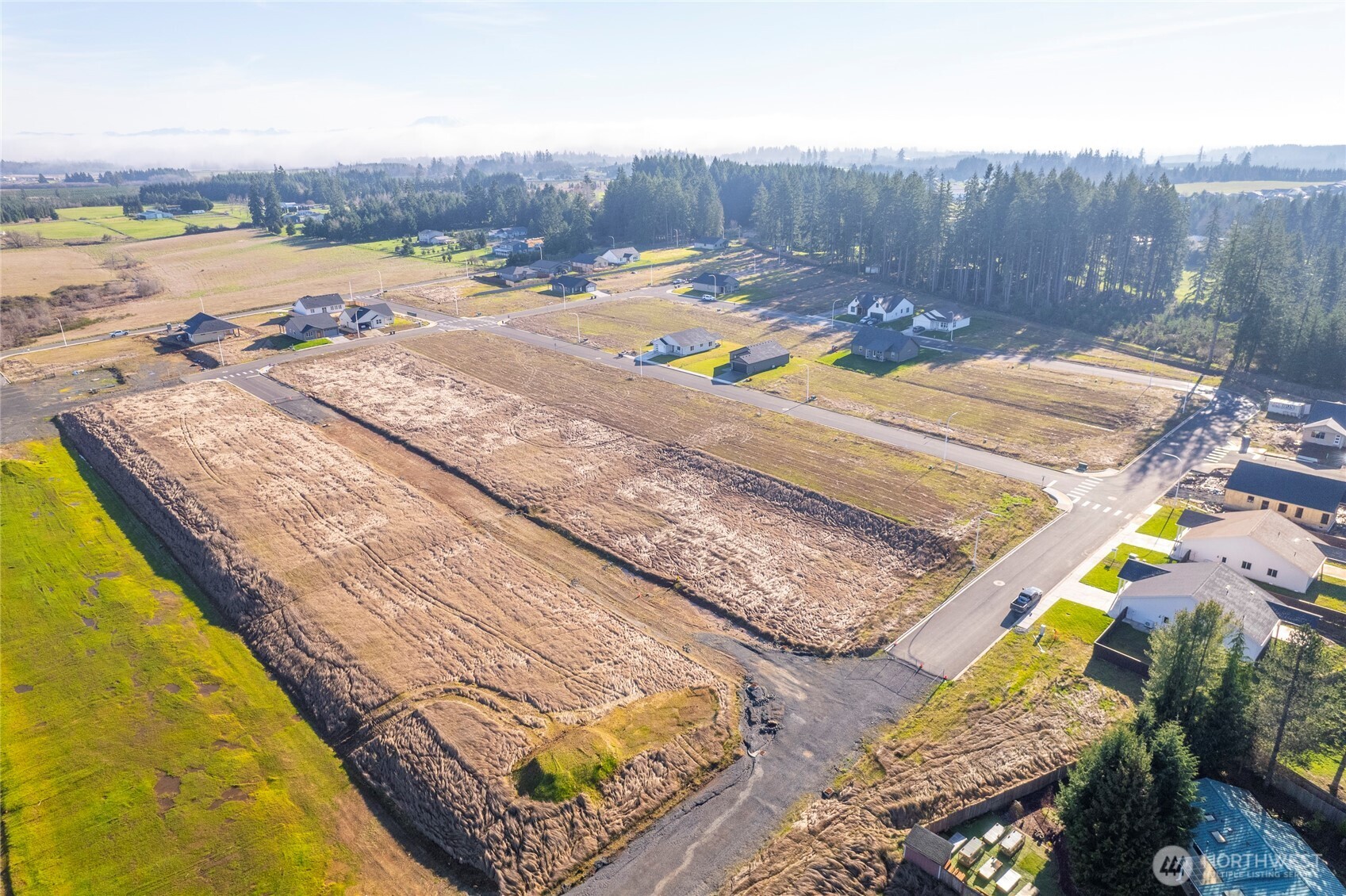 628 Prominence Street Winlock, WA 98596 - Photo 7 of 9 a view of a swimming pool with a lounge chairs