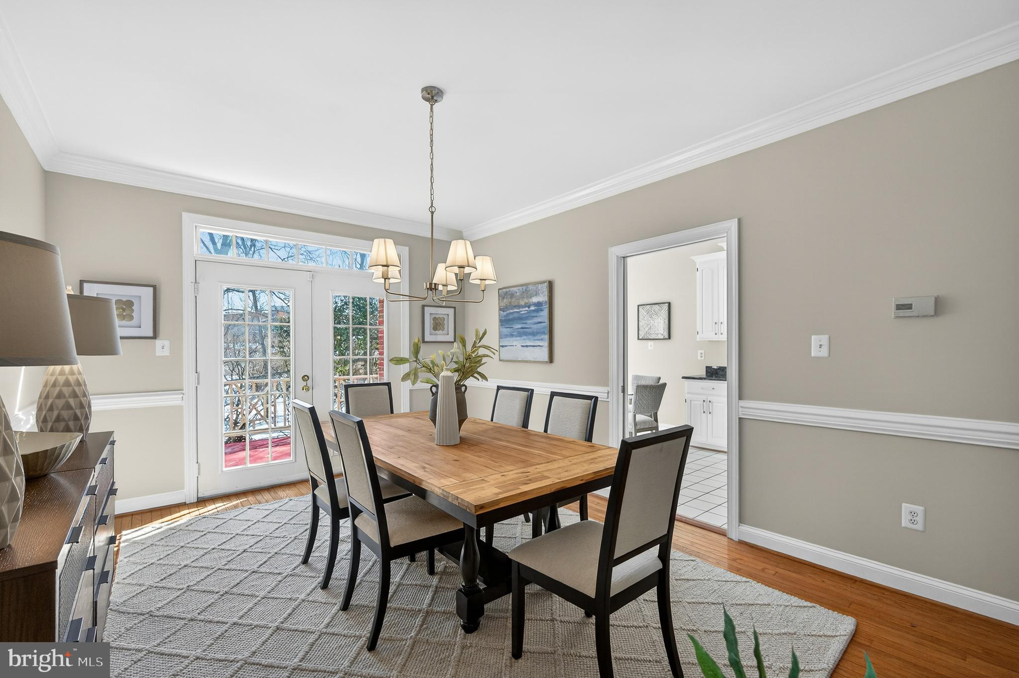 2143 Wolftrap Court Vienna, VA 22182 - Photo 12 of 49 a view of a dining room with furniture window and wooden floor