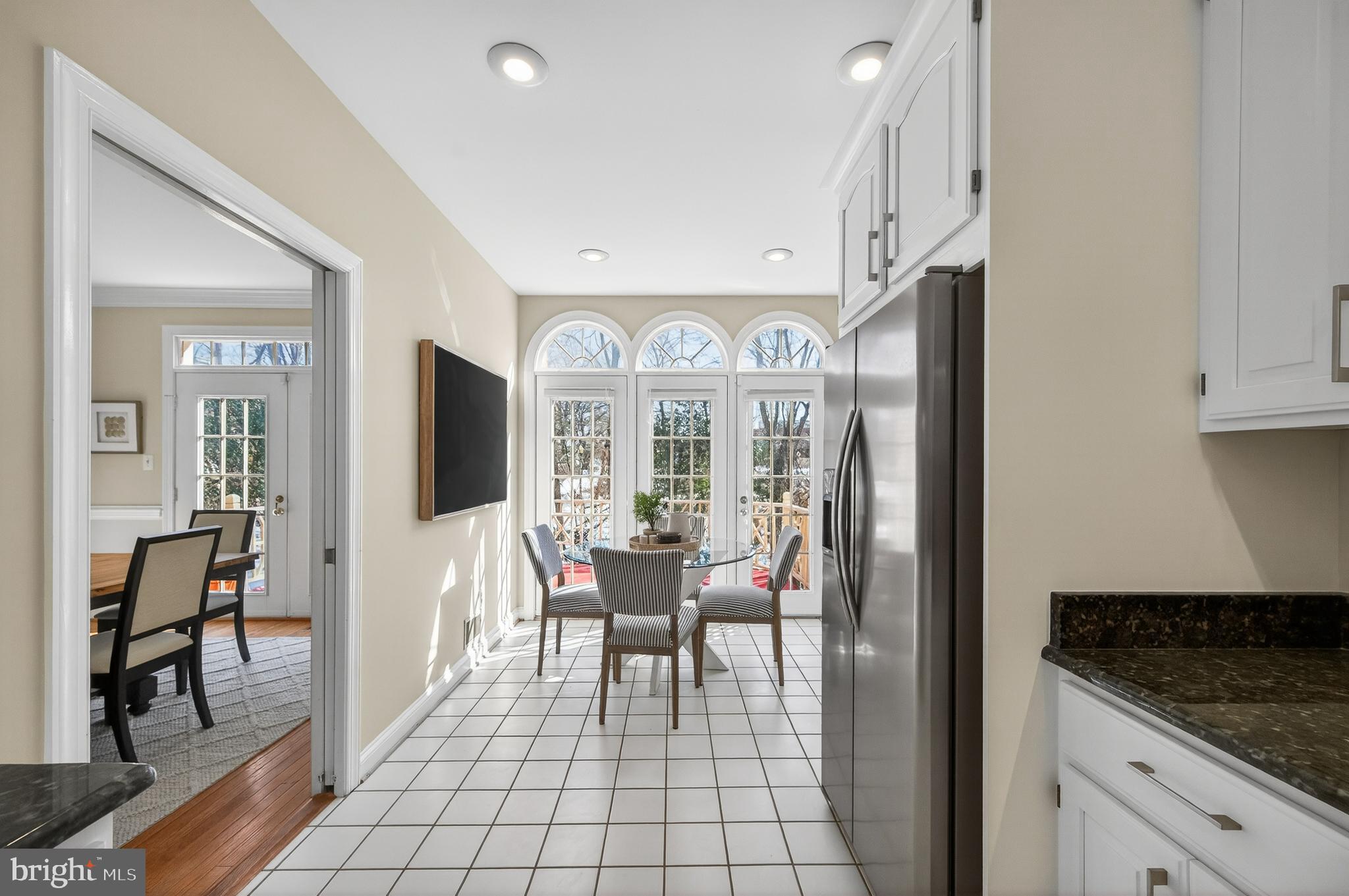 2143 Wolftrap Court Vienna, VA 22182 - Photo 18 of 49 a dining room with furniture and a large window
