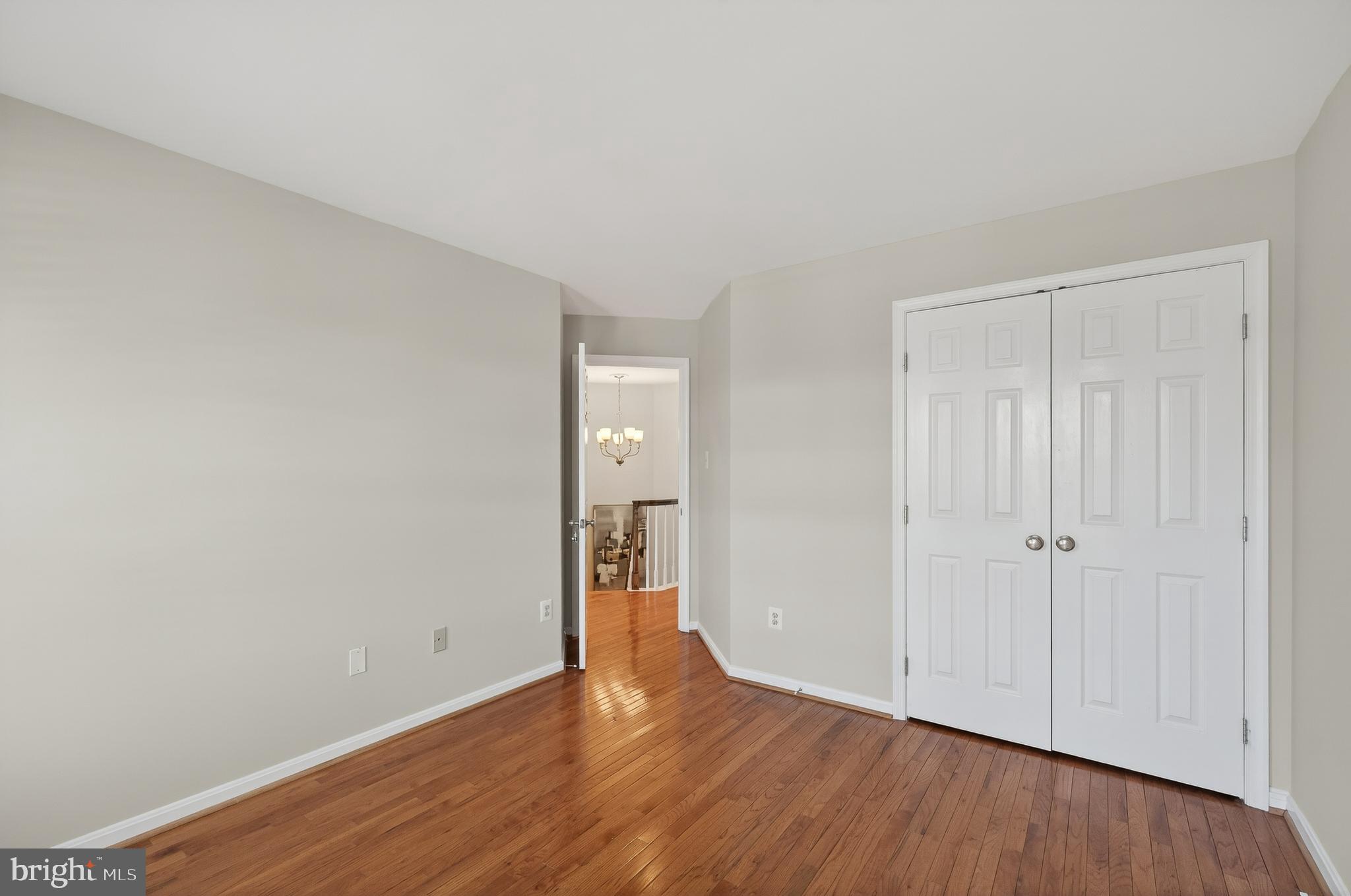 2143 Wolftrap Court Vienna, VA 22182 - Photo 32 of 49 a view of an empty room with wooden floor