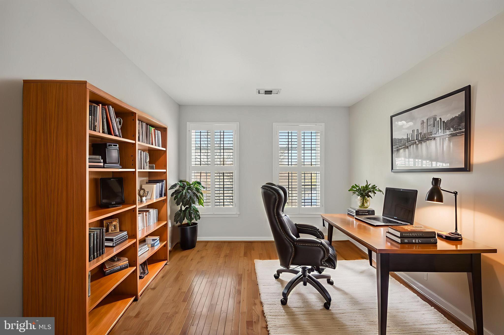 2143 Wolftrap Court Vienna, VA 22182 - Photo 34 of 49 a view of a workspace with furniture and a window