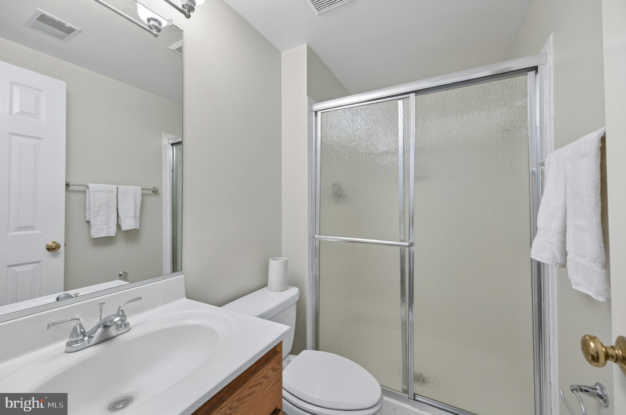 2143 Wolftrap Court Vienna, VA 22182 - Photo 42 of 49 a bathroom with a sink toilet and shower