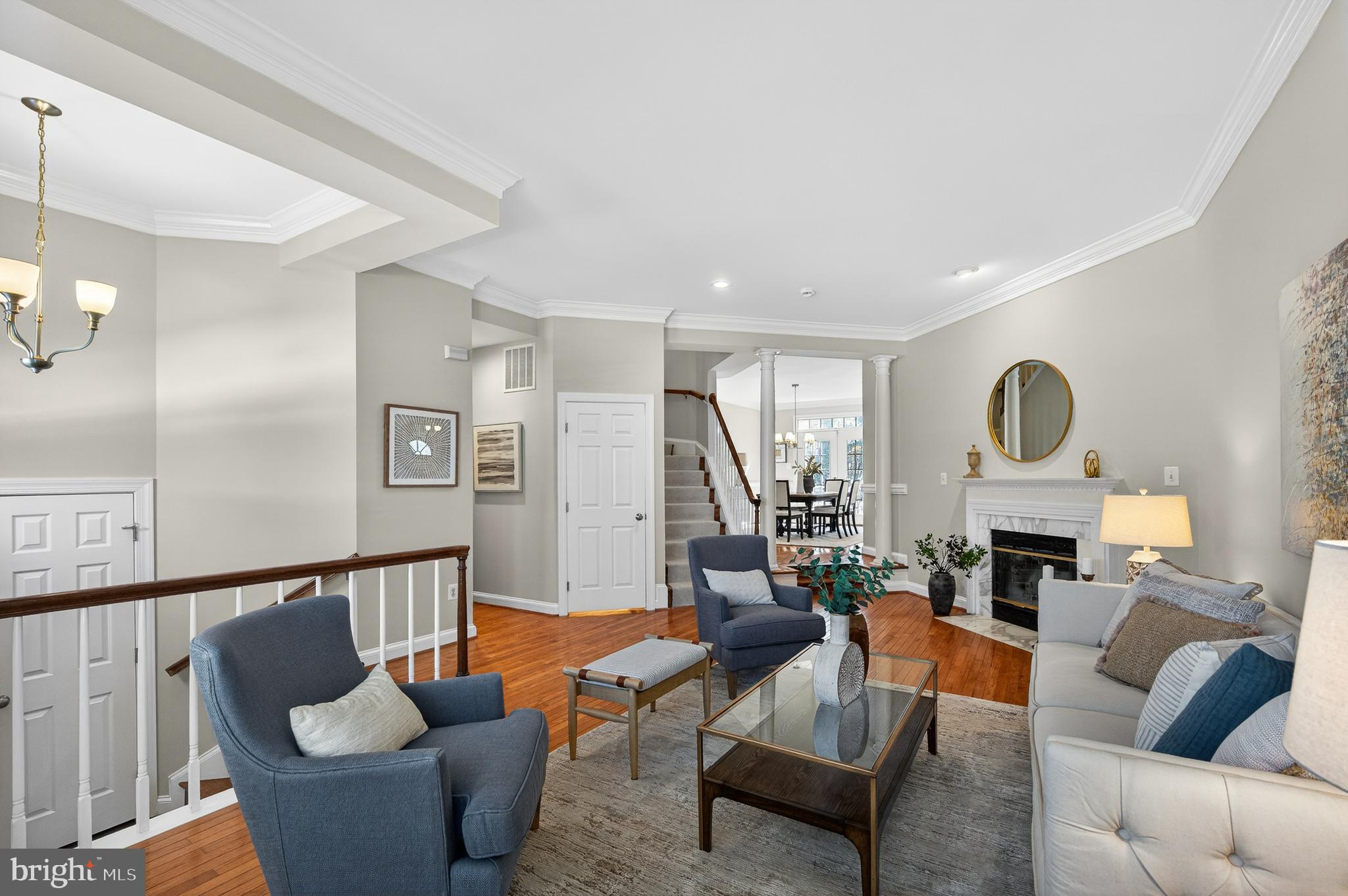 2143 Wolftrap Court Vienna, VA 22182 - Photo 7 of 49 a living room with furniture fireplace and a table