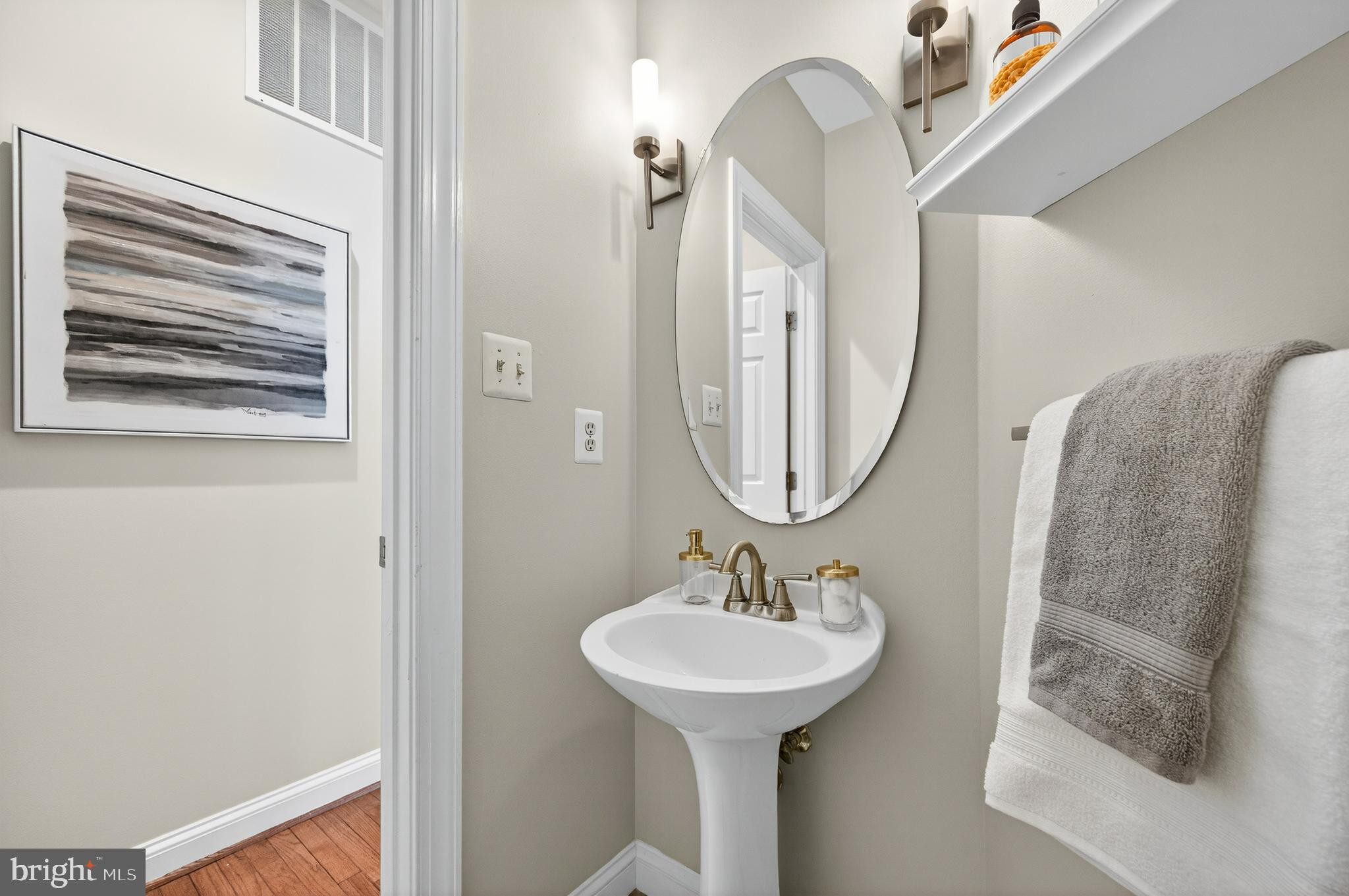 2143 Wolftrap Court Vienna, VA 22182 - Photo 9 of 49 a bathroom with a sink and a mirror
