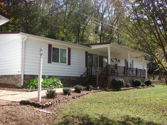 1709 Waverly Road Tennessee Ridge, TN 37178 - Photo 2 of 30 Wait until you see the inside of this home. Metal roof and garage 20widex60x40 with 2 remotes. Tons of areas for garden provided you get to it before the deer, turkey and did you know raccoons love cantaloupe?