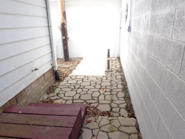 1709 Waverly Road Tennessee Ridge, TN 37178 - Photo 27 of 30 Breezeway between house and L shaped HUGE garage