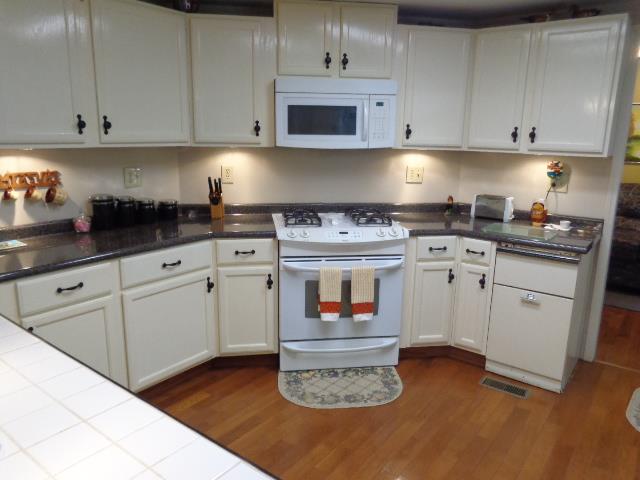 1709 Waverly Road Tennessee Ridge, TN 37178 - Photo 10 of 30 Look at all the kitchen cabinets and counters. YES that a gas (propane) stove.