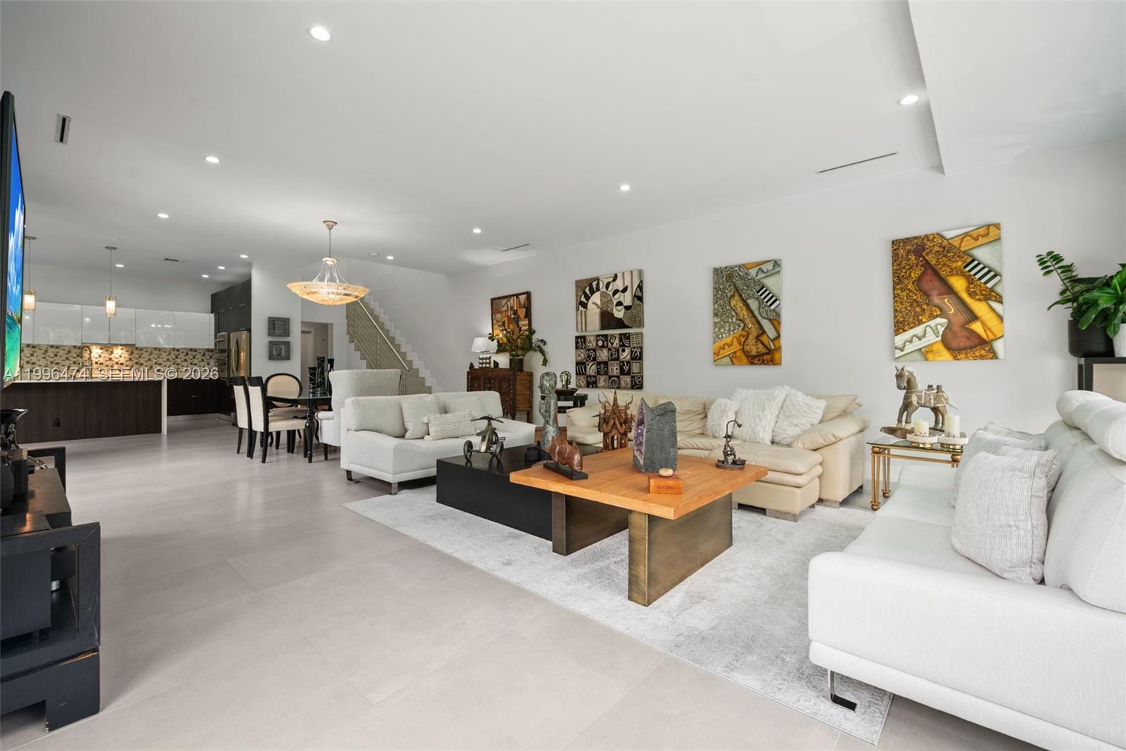 5735 Southwest 35th Street Miami, FL 33155 - Photo 11 of 30 a living room with furniture and kitchen view