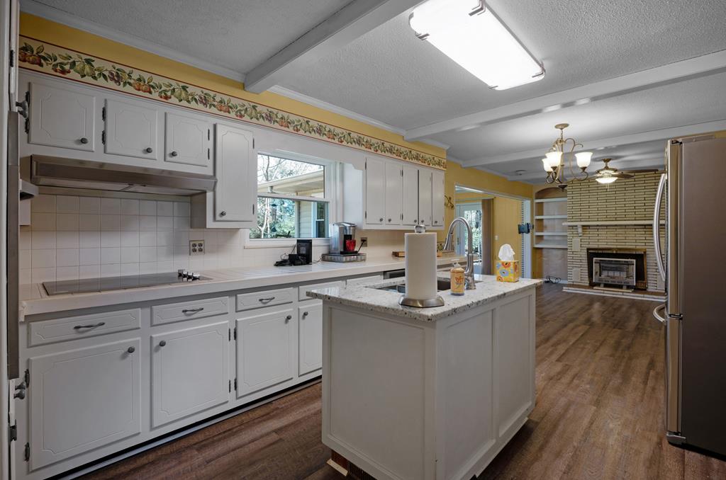 1550 Highway 2 Blue Ridge, GA 30513 - Photo 13 of 46 a kitchen with stainless steel appliances a sink stove and cabinets