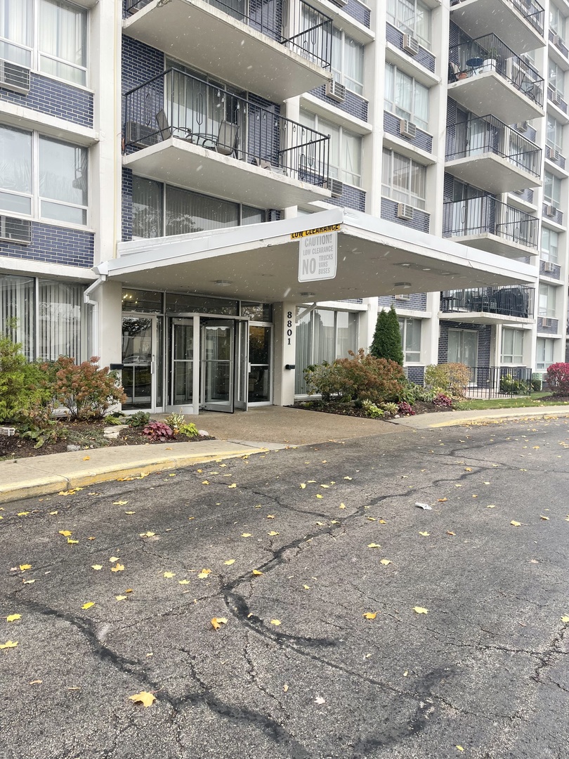 8801 West Golf Road, Unit 3H Niles, IL 60714 - Photo 3 of 33 a front view of a building