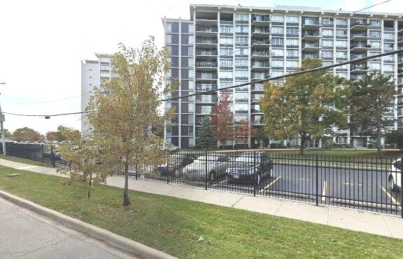 8801 West Golf Road, Unit 3H Niles, IL 60714 - Photo 32 of 33 a view of a balcony with a yard