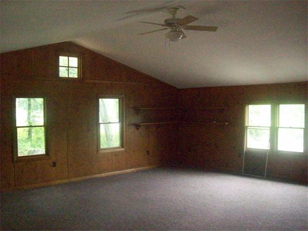 62 Palmer Road Monson, MA 01057 - Photo 12 of 17 an empty room with windows and fan